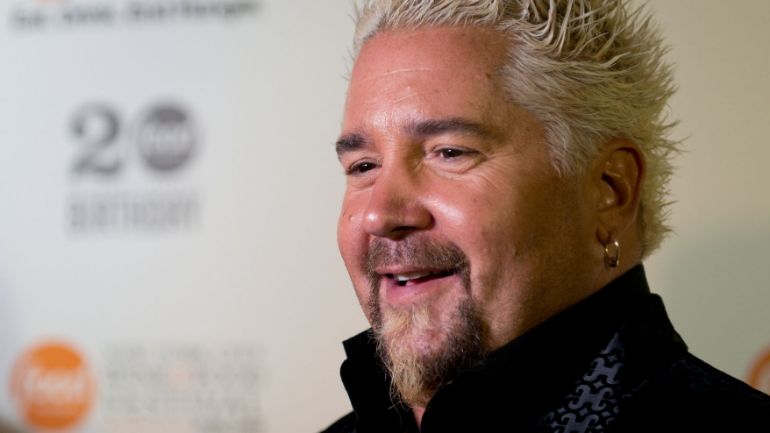 Headshot photo of Guy Fieri, one of the most famous chefs on television.