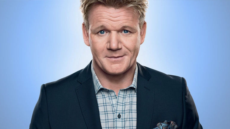 Headshot of Gordon Ramsay, one of the most famous chefs on television in front of a blue background.