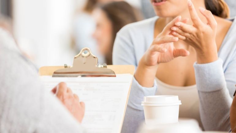 Restaurant manager interviewing an applicant