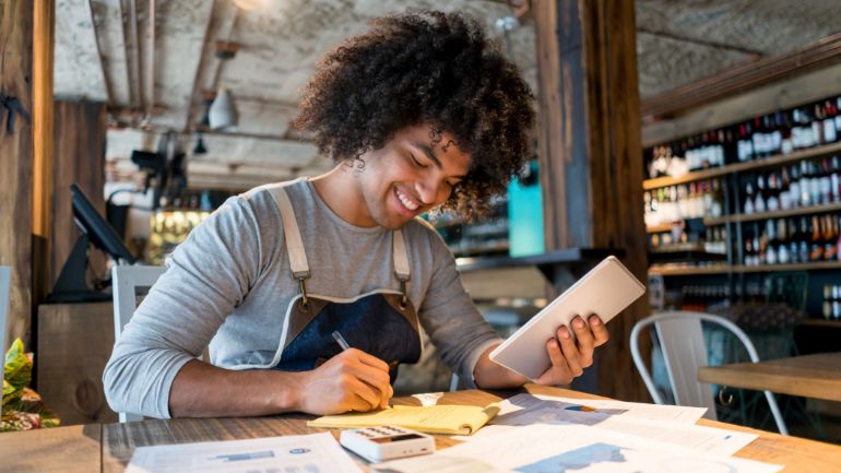 restaurant owner working through financials